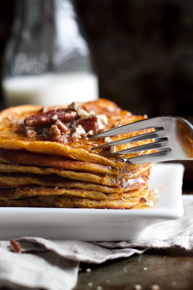 Sweet Potato Greek Yogurt Pancakes that are sure to keep you satisfied all morning with almost 20g of whole food protein! A healthy, easy, and delicious breakfast. | runningwithspoons.com