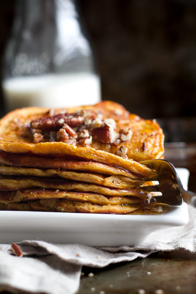 Sweet Potato Greek Yogurt Pancakes that are sure to keep you satisfied all morning with almost 20g of whole food protein! A healthy, easy, and delicious breakfast. | runningwithspoons.com