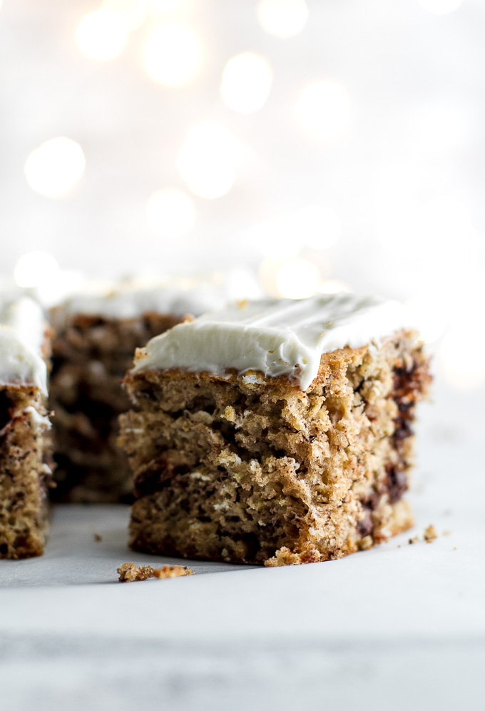 Healthy Banana Cake made without butter or oil, but so tender and flavourful that you’d never be able to tell. Topped with a lightened-up cream cheese frosting, this delicious banana-flavoured cake feels decadent but is actually surprisingly healthy | runningwithspoons.com