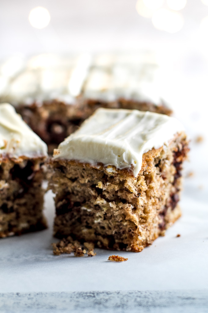 Healthy Banana Cake made without butter or oil, but so tender and flavourful that you’d never be able to tell. Topped with a lightened-up cream cheese frosting, this delicious banana-flavoured cake feels decadent but is actually surprisingly healthy | runningwithspoons.com