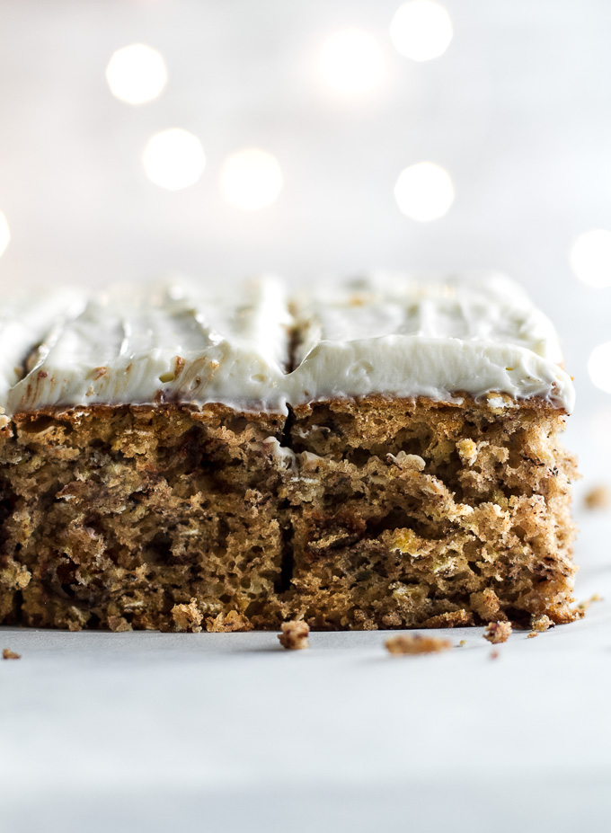 Healthy Banana Cake made without butter or oil, but so tender and flavourful that you’d never be able to tell. Topped with a lightened-up cream cheese frosting, this delicious banana-flavoured cake feels decadent but is actually surprisingly healthy | runningwithspoons.com