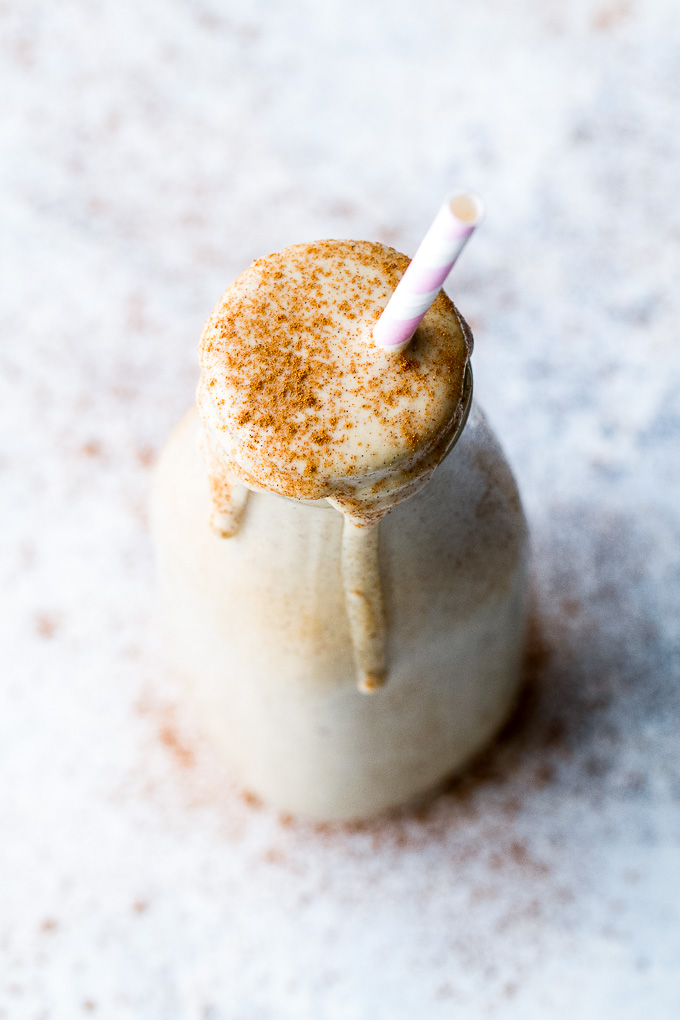 This caramel apple protein smoothie is going to become your favourite way to enjoy an apple a day! It's super creamy, packed with protein, and guaranteed to keep you satisfied all morning! | runningwithspoons.com