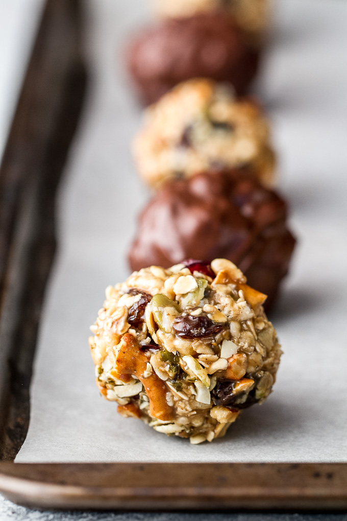 Sweet, salty, chewy, and crisp, these no-bake trail mix bites are sure to satisfy any craving! Gluten-free, nut-free, and vegan, they’re a healthy snack that anyone can enjoy! | runningwithspoons.com