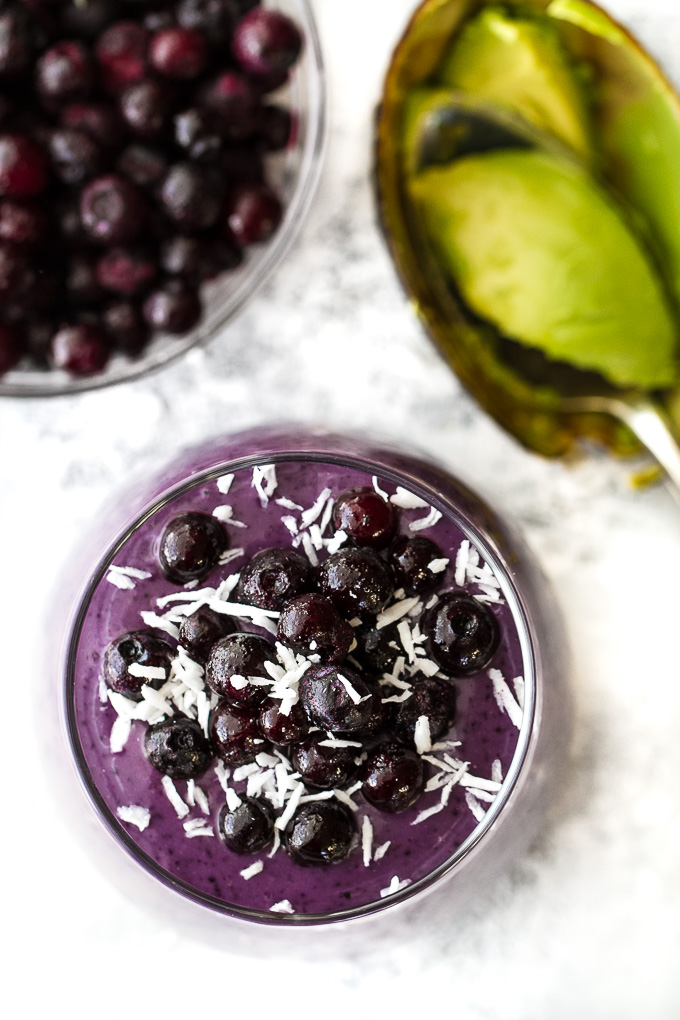 This super creamy blueberry avocado smoothie is packed with protein, healthy fats, vitamins and antioxidants. Gluten-free and easily made vegan, it makes a healthy and delicious breakfast or snack | runningwithspoons.com