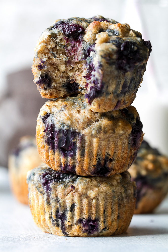Maple Flax Blueberry Oatmeal Muffins - naturally sweetened and loaded with wholesome ingredients for a deliciously healthy breakfast or snack! | runningwithspoons.com