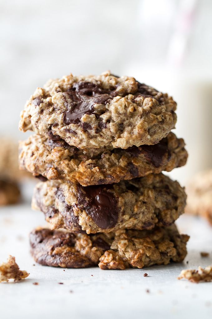 Chocolate chip banana oatmeal cookies made with healthy ingredients and loaded with plenty of chocolate and oats! They're gluten-free, vegan, and make a perfect snack for any time of the day! | runningwithspoons.com