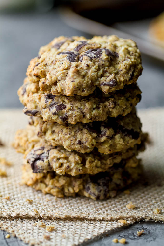 Soft, chewy, and loaded with chocolate oaty goodness! These healthy chocolate chip oatmeal cookies are made with wholesome ingredients and make a perfect snack for any time of the day! {one-bowl, vegan, gluten-free, delicious!!} | runningwithspoons.com