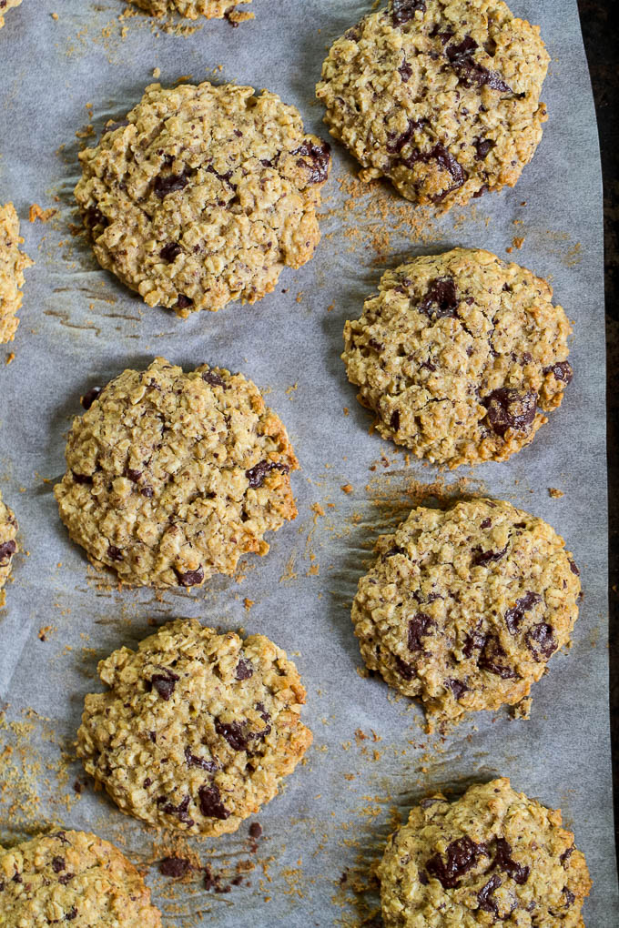 Soft, chewy, and loaded with chocolate oaty goodness! These healthy chocolate chip oatmeal cookies are made with wholesome ingredients and make a perfect snack for any time of the day! {one-bowl, vegan, gluten-free, delicious!!} | runningwithspoons.com