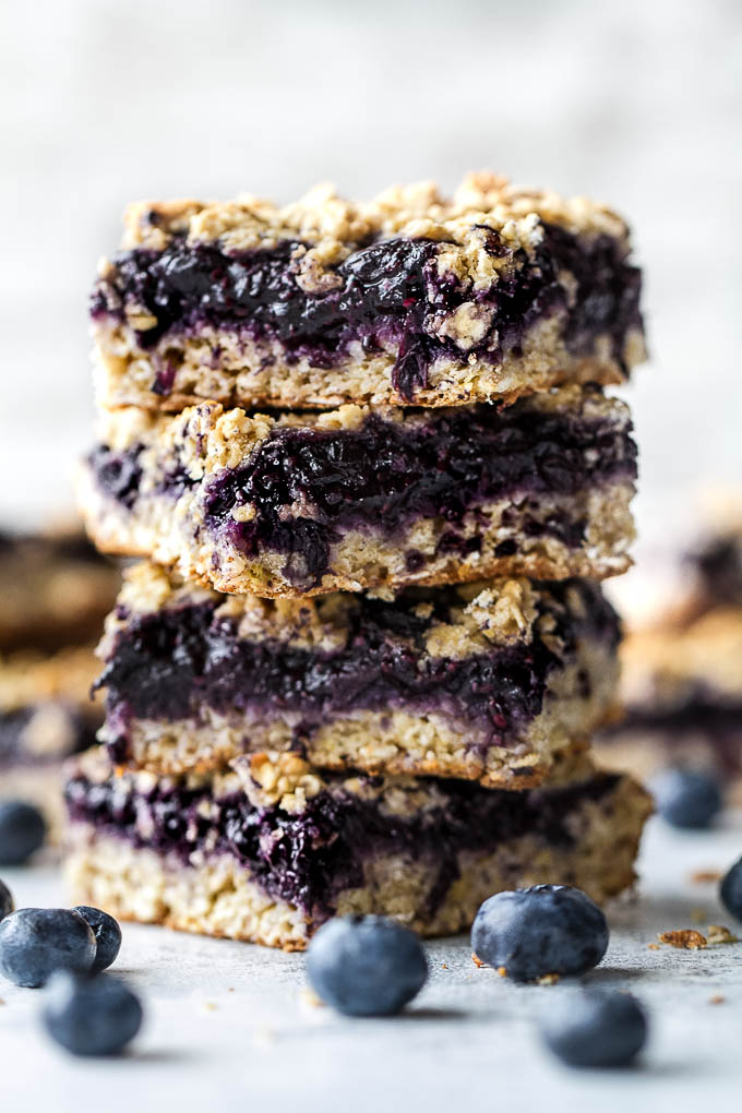 Blueberry Banana Oat Bars - you'd never believe that these soft and chewy bars are vegan, gluten-free, refined sugar-free, and made without any butter or oil! The perfect healthy breakfast or snack! | runningwithspoons.com