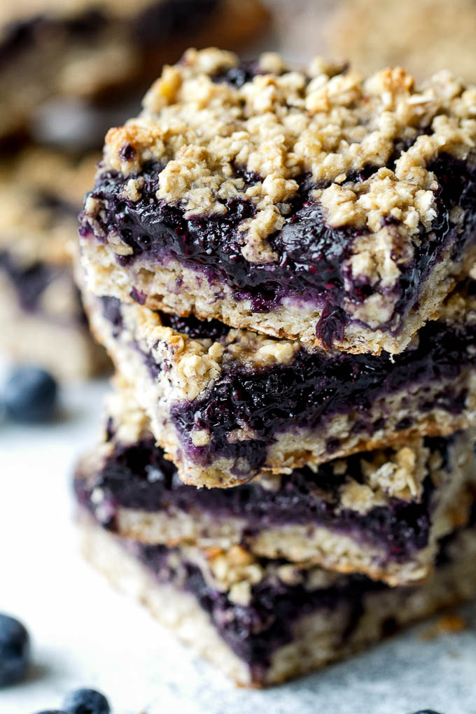 Blueberry Banana Oat Bars - you'd never believe that these soft and chewy bars are vegan, gluten-free, refined sugar-free, and made without any butter or oil! The perfect healthy breakfast or snack! | runningwithspoons.com