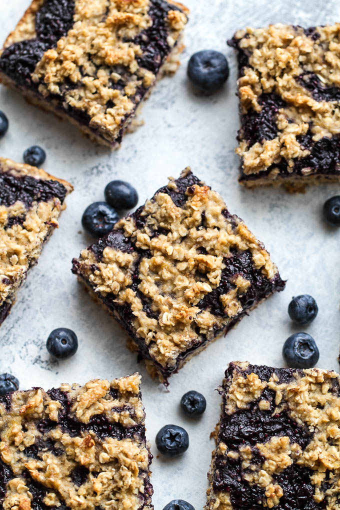 Blueberry Banana Oat Bars - you'd never believe that these soft and chewy bars are vegan, gluten-free, refined sugar-free, and made without any butter or oil! The perfect healthy breakfast or snack! | runningwithspoons.com