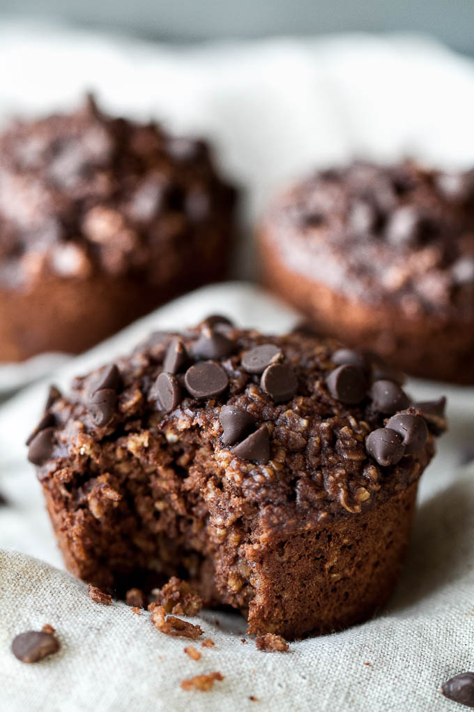 Brownie Batter Breakfast Muffins that are naturally sweetened and loaded with chocolate flavour! They're a deliciously healthy way to start your day or pull out whenever you need a satisfying snack | runningwithspoons.com