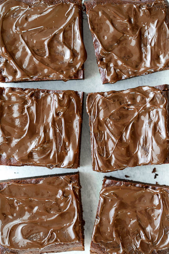 Flourless Sweet Potato Brownies made in the blender with only 7 ingredients! They’re grain-free, oil-free, dairy-free, and refined-sugar-free, so they make a deliciously healthy gluten-free treat for when those chocolate cravings hit | runningwithspoons.com