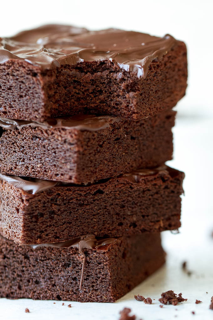 Flourless Sweet Potato Brownies made in the blender with only 7 ingredients! They’re grain-free, oil-free, dairy-free, and refined-sugar-free, so they make a deliciously healthy gluten-free treat for when those chocolate cravings hit | runningwithspoons.com