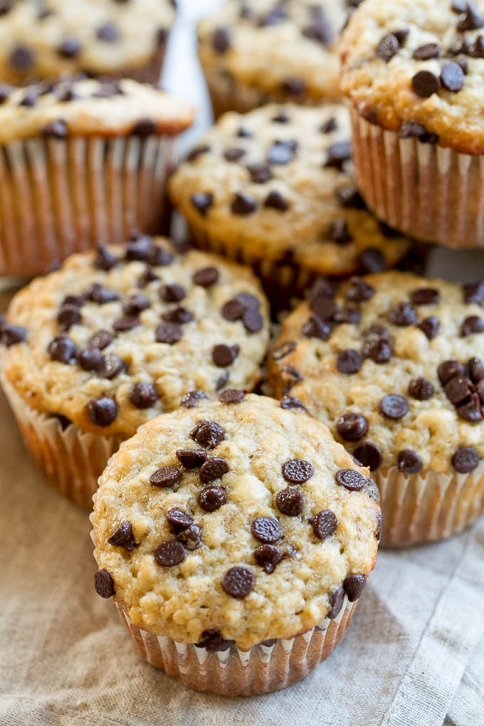 One Bowl Chocolate Chip Banana Oat Muffins - so soft and tender that you'd never guess they're made without butter or oil. Deliciously healthy and SUPER easy to whip up using just one bowl! | runningwithspoons.com