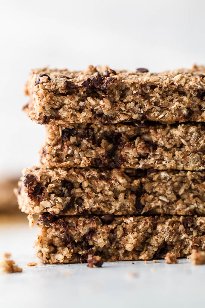 So much better than store-bought! These honey almond granola bars are made without any refined sugars or oils, with just the perfect touch of honey and almond flavour! They’re gluten-free, vegan, and easily made nut-free if you need them to be. The perfect easy and healthy snack! | runningwithspoons.com