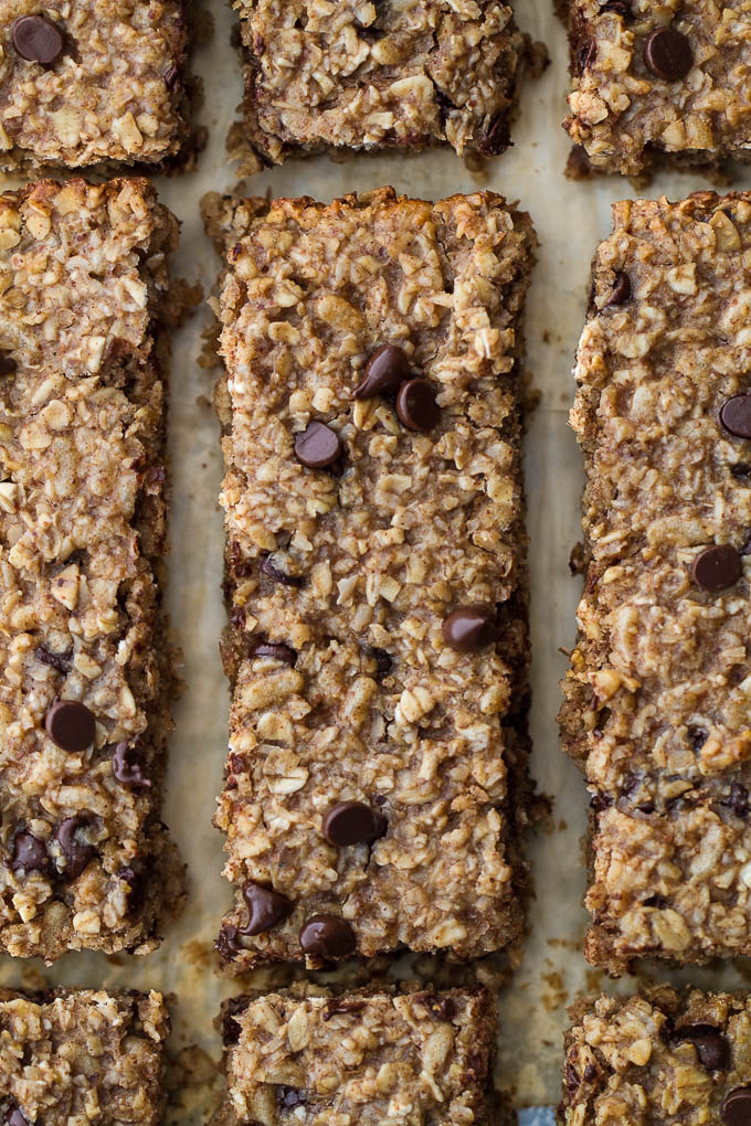 So much better than store-bought! These honey almond granola bars are made without any refined sugars or oils, with just the perfect touch of honey and almond flavour! They’re gluten-free, vegan, and easily made nut-free if you need them to be. The perfect easy and healthy snack! | runningwithspoons.com