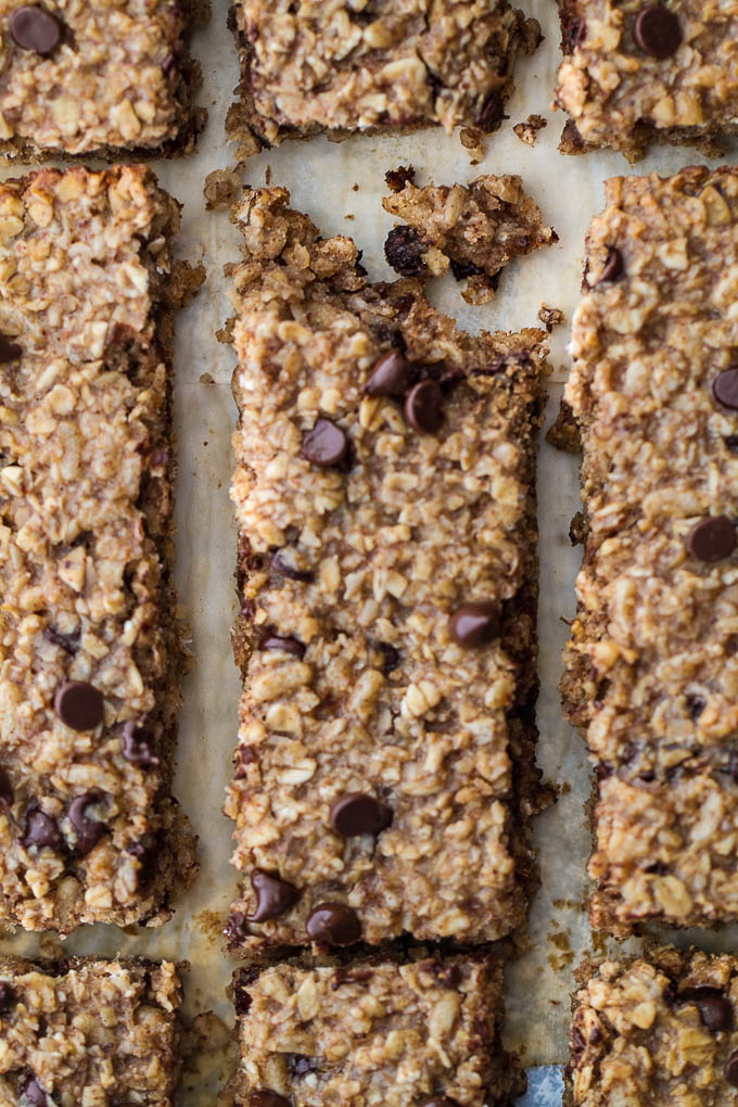So much better than store-bought! These honey almond granola bars are made without any refined sugars or oils, with just the perfect touch of honey and almond flavour! They’re gluten-free, vegan, and easily made nut-free if you need them to be. The perfect easy and healthy snack! | runningwithspoons.com