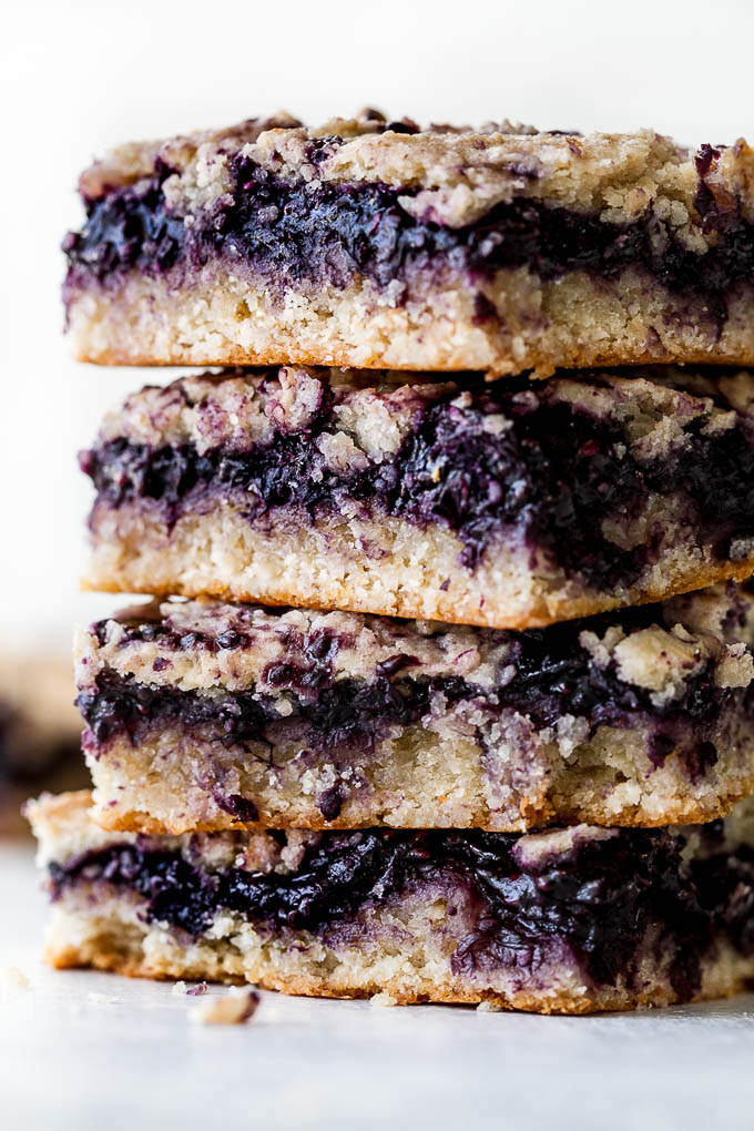 Blueberry Almond Oat Bars that are so tender and "buttery" you'd never guess they're made without any flour or butter! | runningwithspoons.com #glutenfree #vegan #recipe #snack #healthy