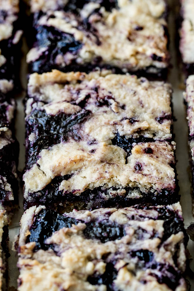 Blueberry Almond Oat Bars that are so tender and "buttery" you'd never guess they're made without any flour or butter! | runningwithspoons.com #glutenfree #vegan #recipe #snack #healthy