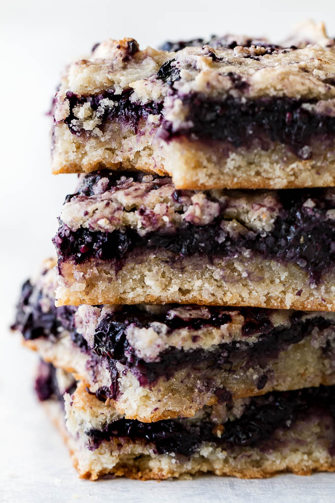 Blueberry Almond Oat Bars that are so tender and "buttery" you'd never guess they're made without any flour or butter! | runningwithspoons.com #glutenfree #vegan #recipe #snack #healthy