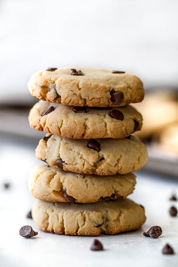 These Grain Free Vegan Chocolate Chip Cookies have the same texture and taste as a classic chocolate chip cookie, but are made without flour, butter, eggs, or refined sugar! | runningwithspoons.com #paleo #vegan #glutenfree #recipe