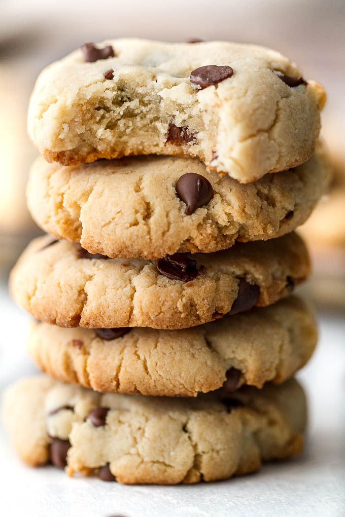 These Grain Free Vegan Chocolate Chip Cookies have the same texture and taste as a classic chocolate chip cookie, but are made without flour, butter, eggs, or refined sugar! | runningwithspoons.com #paleo #vegan #glutenfree #recipe