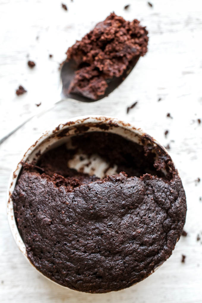 This chocolate banana minute muffin is a perfect way to satisfy those chocolate cravings and takes under 5 minutes to make! It's vegan, gluten-free, nut-free, and made with wholesome ingredients, but so light, tender, and chocolatey that you'd never guess it was healthy! | runningwithspoons.com #recipe #vegan #glutenfree #chocolate #healthy #dessert