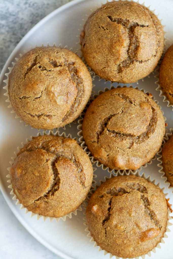 Healthy Banana Nut Muffins that are so light, tender, and loaded with flavour, you’d never know they were made without flour, oil, eggs, or refined sugar!