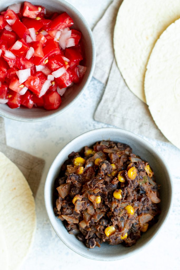 A quick and easy black bean taco filling that even meat eaters will love! Loaded with flavour and plant-based protein, it makes a perfect vegan option for your next taco night!