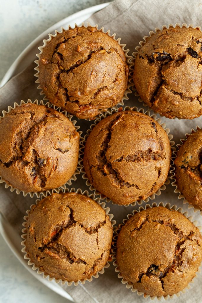 Easy Morning Glory Muffins that are so tender and loaded with flavour, you’d never know they were made without flour, oil, eggs, or refined sugar.