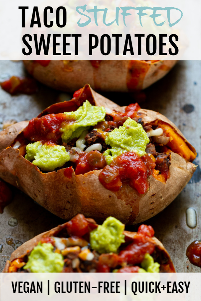 Taco stuffed sweet potatoes topped with avocado and salsa.