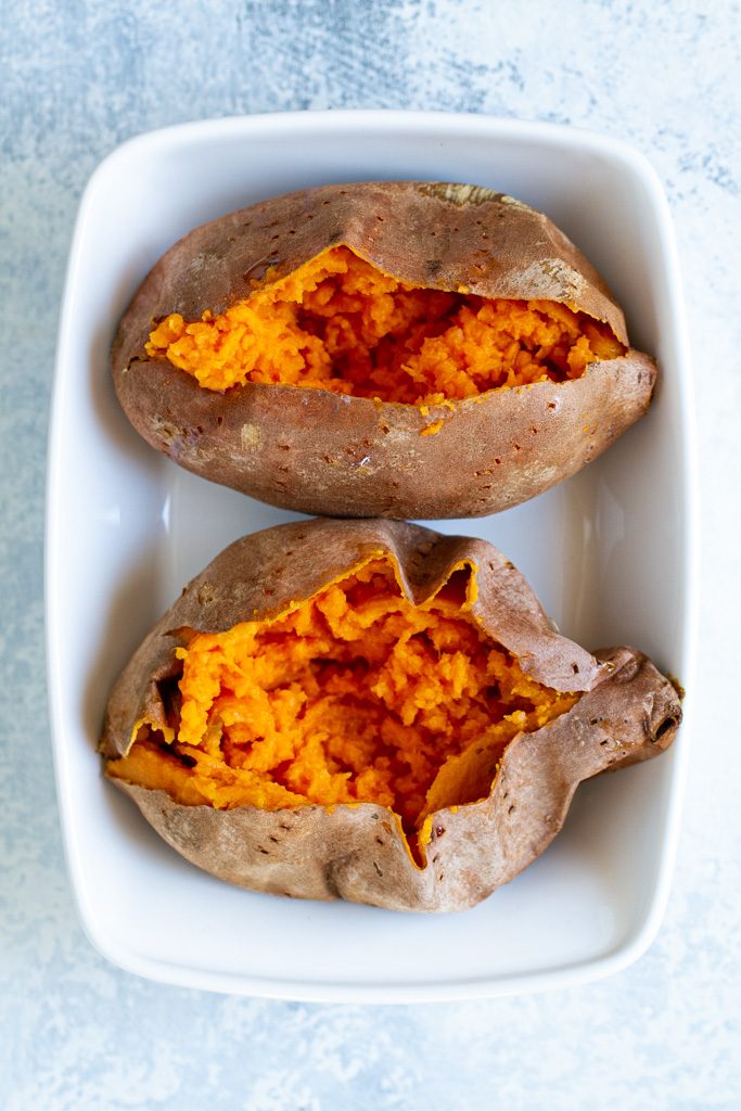 Plain sweet potatoes on a white plate.