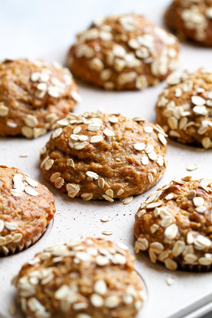 Healthy banana oat muffins in a muffin pan.